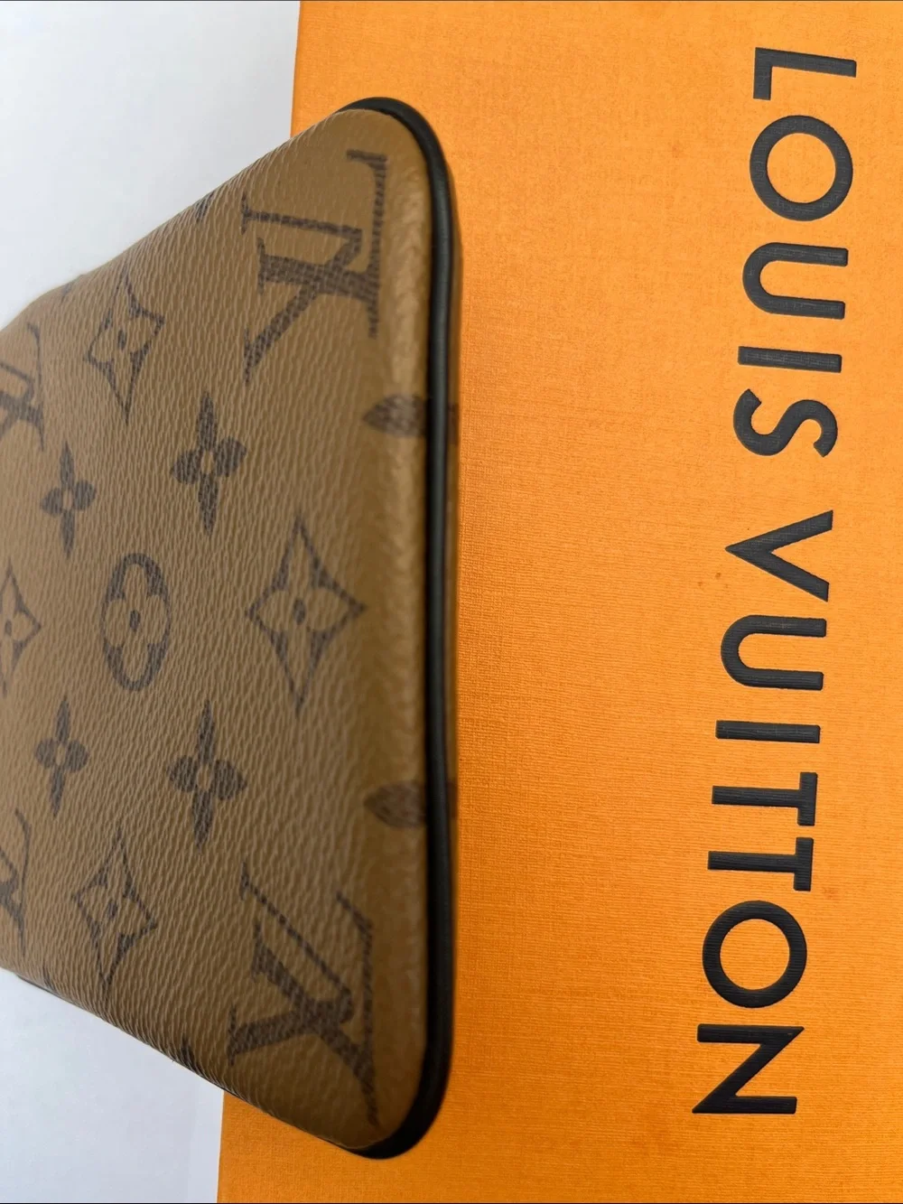 Louis Vuitton LV monogram reverse square pouch from Trio Pouch